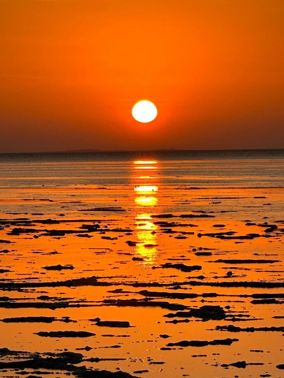 Expedition camp at sunset in the Danakil Depression with volcanic horizon, Afar Ethiopia