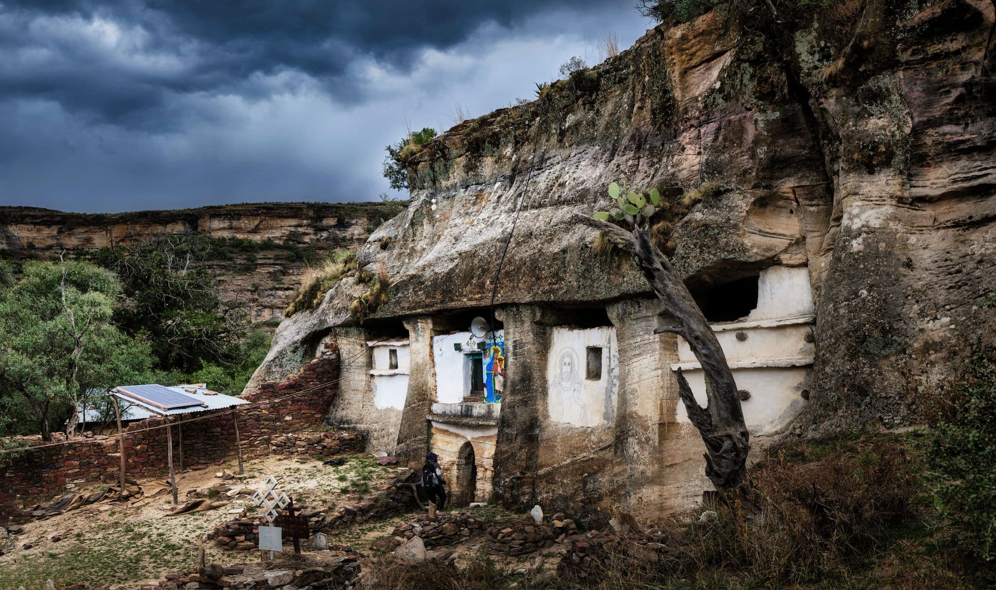 Ancient rock-hewn church carved into a sheer cliff face in Tigray region, Northern Ethiopia